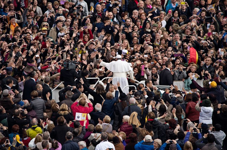 Thousands turn out in Rome to greet Francis during his biweekly audiences.