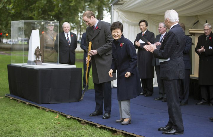 South Korea's President Park Geun-hye stands with Britain's Prince William during a ground breaking ceremony at the proposed site of a memorial in London for British soldiers killed in the Korean War